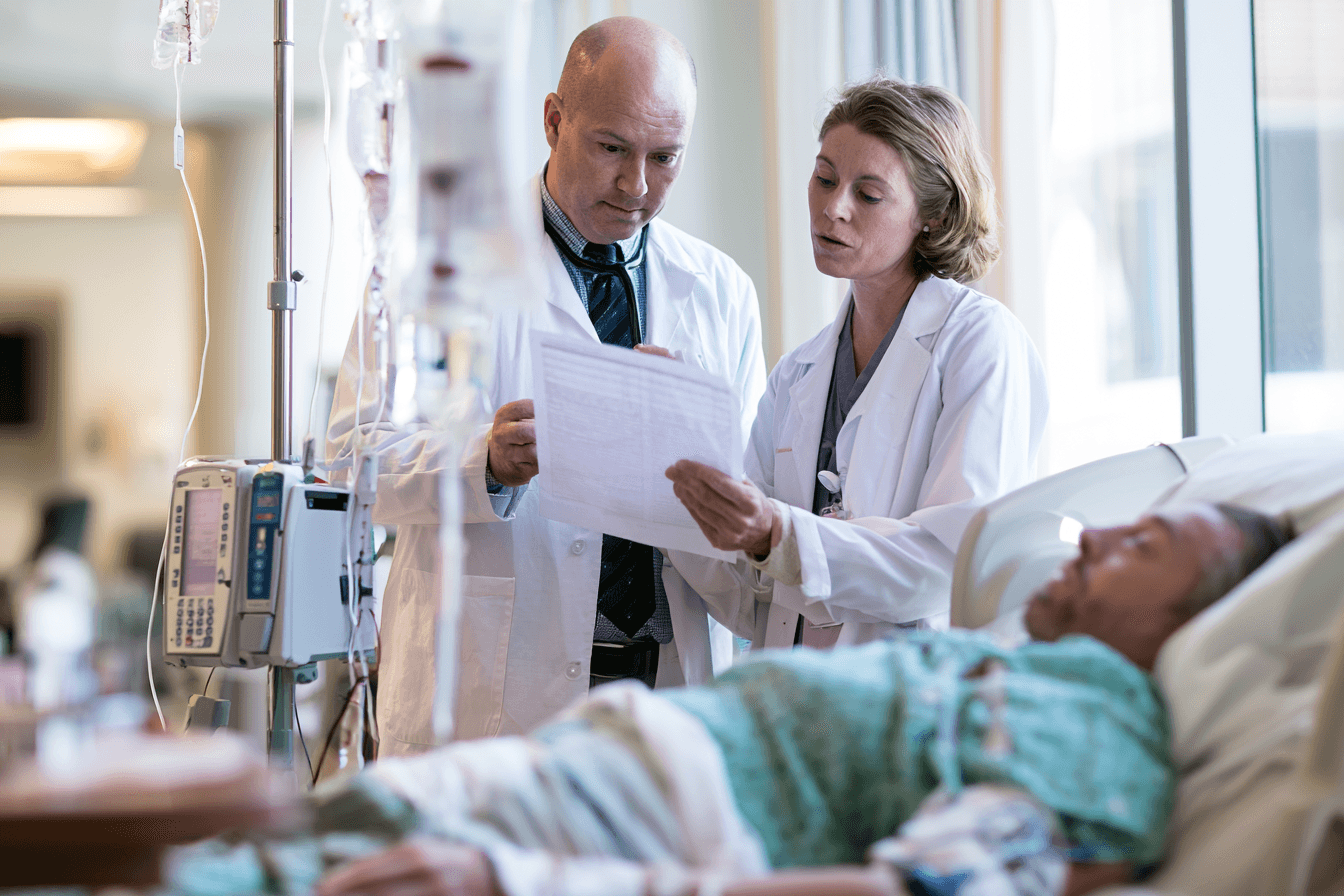 Oncology team reviews test results before pausing or modifying chemotherapy for patient safety.