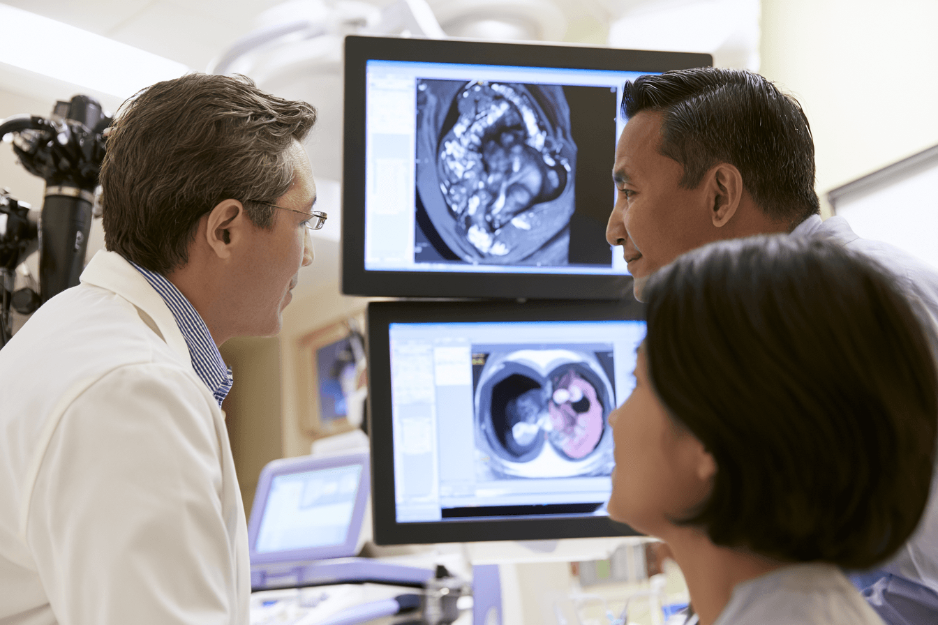Metastatic Esophageal Cancer: Treatment, Survival And The Ayurveda Curative Model 5 Gastroenterologist and radiologist reviewing endoscopy and pet ct findings used to diagnose metastatic esophageal cancer.