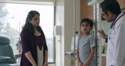 Pediatric hematologist measuring the height of a child with thalassemia during growth and organ health monitoring